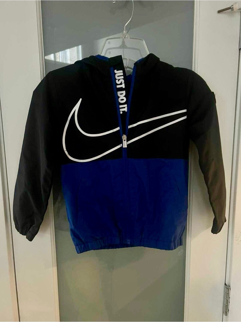 Nike Black Zip Hoodie with Blue Trim and White Swoosh